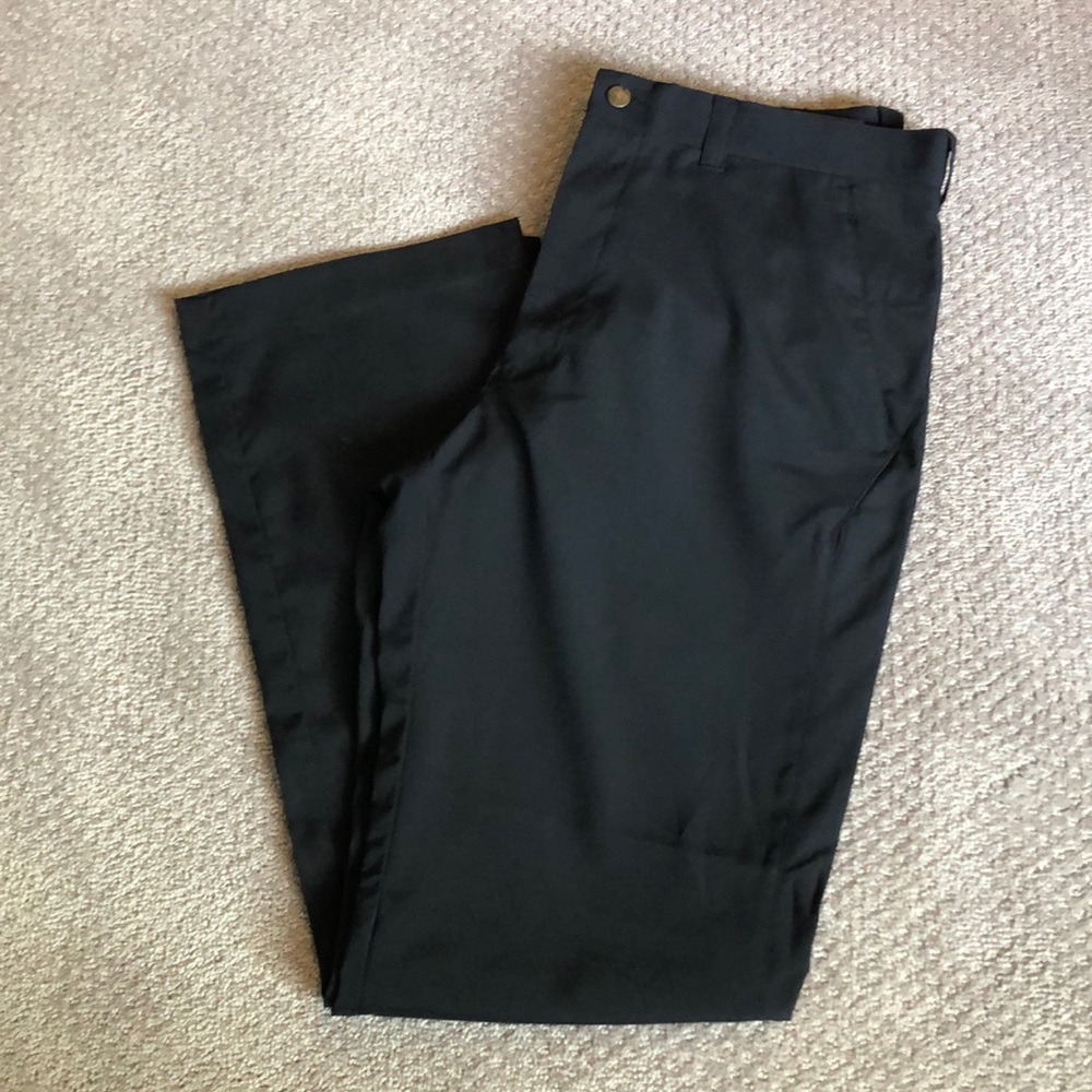 Brand new Callaway black golf/dress pants